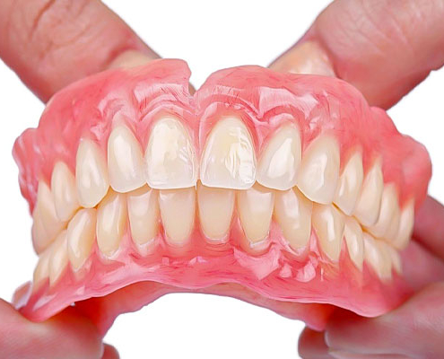 پروتز دندان چیست و چه مزایا و معایبی دارد؟